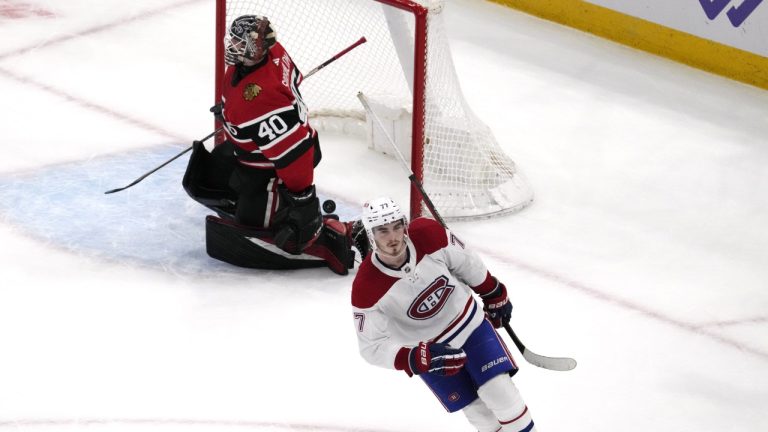 Montreal Canadiens center Kirby Dach (77) skates after scoring a goal as Chicago Blackhawks goaltender Arvid Soderblom (40) reacts in a shootout of an NHL hockey game in Chicago, Friday, Nov. 25, 2022. (Nam Y. Huh/AP)