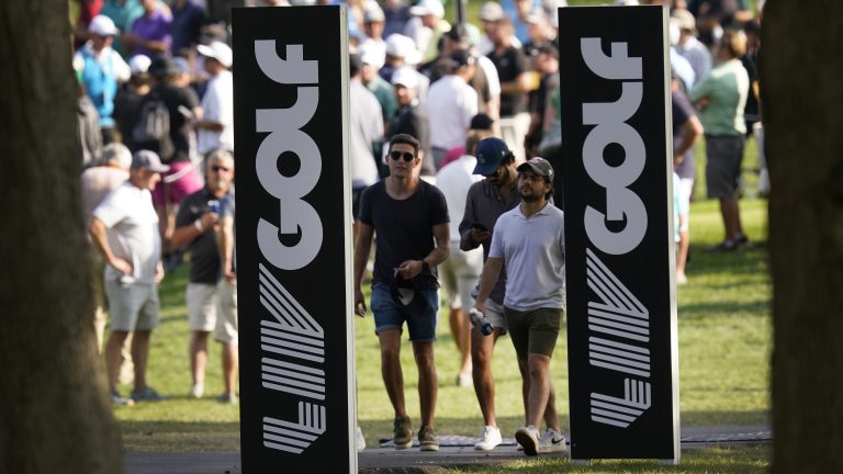 Spectators walk the Rich Harvest Farms golf course during the first round of the LIV Golf Invitational-Chicago tournament Friday, Sept. 16, 2022, in Sugar Grove, Ill. (Charles Rex Arbogast/AP)