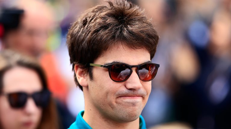 Aston Martin driver Lance Stroll, of Canada, grimaces prior to the start of the Formula One Mexico Grand Prix auto race at the Hermanos Rodriguez racetrack in Mexico City, Sunday, Oct. 30, 2022.  (Carlos Perez Gallardo/AP)