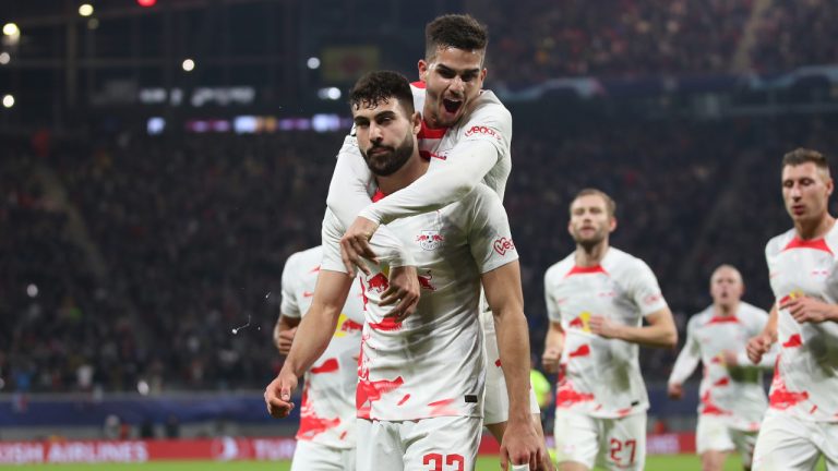 Leipzig's Josko Gvardiol, centre, celebrates with teammates after scoring his side's opening goal during the UEFA Champions League round of sixteen first leg soccer match between RB Leipzig and Manchester City in Leipzig, Germany, Wednesday, Feb. 22, 2023. (Andreas Gora/AP)