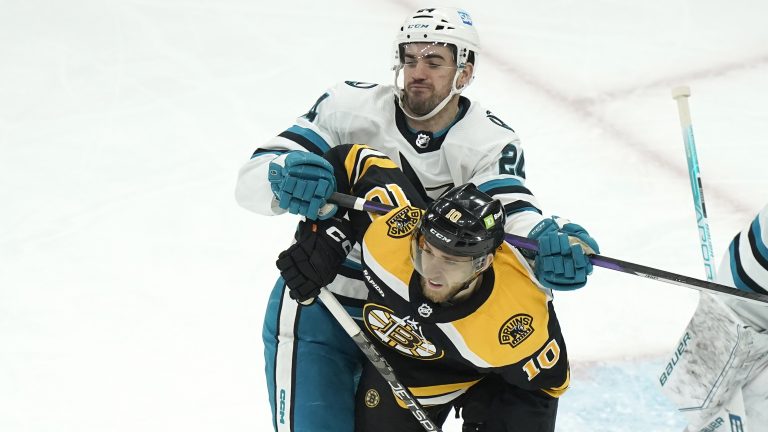 San Jose Sharks defenseman Jaycob Megna (24) collides with Boston Bruins left wing A.J. Greer (10) in the first period of an NHL hockey game, Sunday, Jan. 22, 2023, in Boston. (Steven Senne/AP)