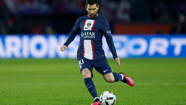 PSG's Lionel Messi shoots a free kick during the French League One soccer match between Paris Saint-Germain and Toulouse, at the Parc des Princes, in Paris, France, Saturday, Feb. 4, 2023. (Lewis Joly/AP)