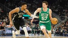 Bucks edge Celtics in overtime to extend win streak to 11