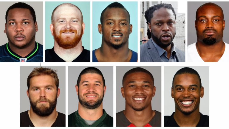 This combo of file photos, shows former 9 of the 10 retired NFL football players, who have accused the league of lies, bad faith and flagrant violations of federal law in denying disability benefits in a potential class action lawsuit filed Thursday, Feb. 9, 2023, in Baltimore. The men say they left the game with lingering physical or cognitive injuries that make their daily lives difficult if not excruciating. They are, top row from left, Jay Alford, Daniel Loper, Willis McGahee, Mike McKenzie, Jamize, Olawale, bottom row from left, Alex Parsons, Eric Smith, Charles Sims and Joey Thomas. Lanze Zeno is not shown. (AP Photo/File)