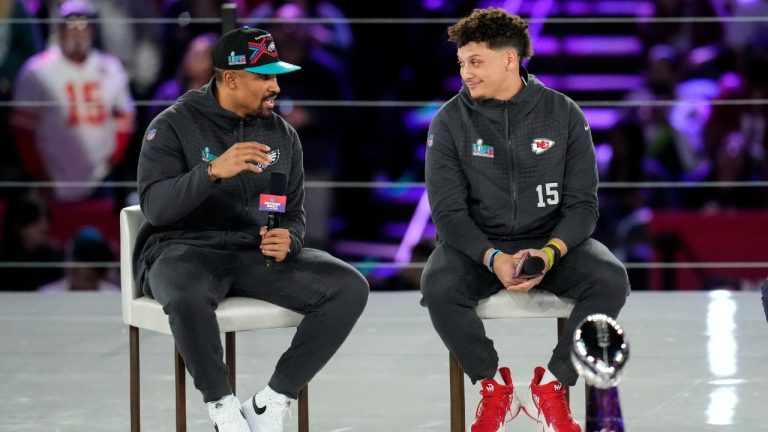 Kansas City Chiefs quarterback Patrick Mahomes, right, and Philadelphia Eagles quarterback Jalen Hurts speak to the media during the NFL football Super Bowl 57 opening night, Monday, Feb. 6, 2023, in Phoenix. The Kansas City Chiefs will play the Philadelphia Eagles on Sunday. (Ross D. Franklin/AP)