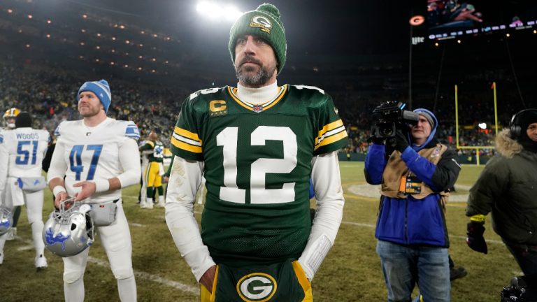 Green Bay Packers quarterback Aaron Rodgers stands on the field following an NFL football game against the Detroit Lions Sunday, Jan. 8, 2023, in Green Bay, Wis. The Lions won 20-16. (Morry Gash/AP)