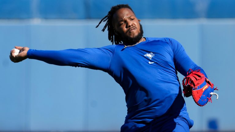 Toronto Blue Jays first baseman Vladimir Guerrero Jr. throws the ball in a drill during baseball spring training in Dunedin, Fla. (Nathan Denette/CP)