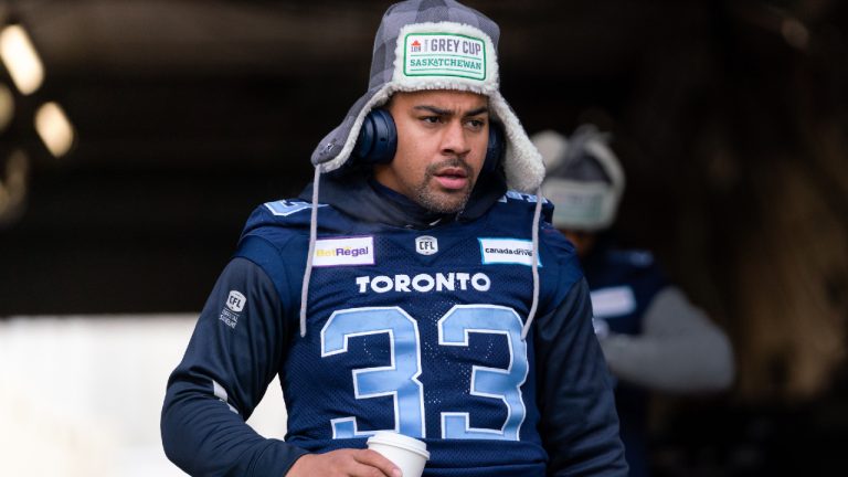 Toronto Argonauts running back Andrew Harris walks out of the tunnel before a walkthrough ahead of the 109th Grey Cup at Mosaic Stadium in Regina, Saturday, Nov. 19, 2022. (Heywood Yu/CP)