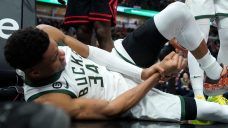 Bucks lose Antetokounmpo to wrist injury but extend win streak to 12