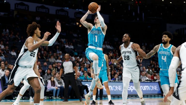 Charlotte Hornets guard LaMelo Ball (1) shoots during the first half of the team's NBA basketball game against the San Antonio Spurs on Wednesday, Feb. 15, 2023, in Charlotte, N.C. (Brian Westerholt/AP)