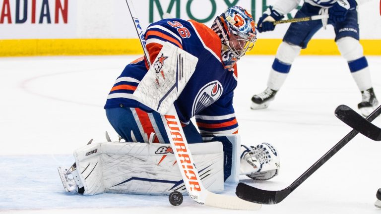 Edmonton Oilers goalie Jack Campbell (36) makes the save against Tampa Bay Lightning during first period NHL action in Edmonton on Thursday January 19, 2023. (Jason Franson/CP)