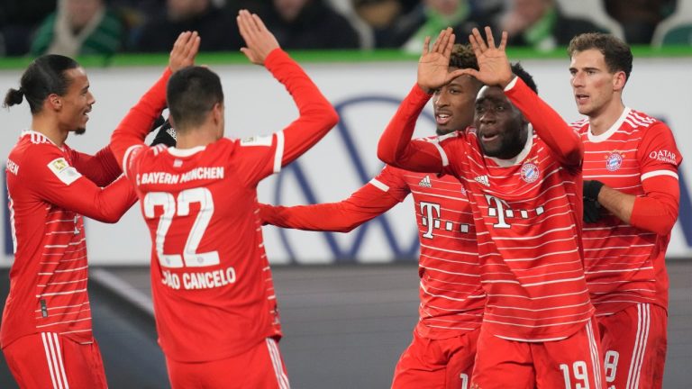 Bayern players celebrate after Kingsley Coman, third from right, scored his side's second goal during the German Bundesliga soccer match between VfL Wolfsburg and FC Bayern Munich in Wolfsburg, Germany, Sunday, Feb. 5, 2023. (Michael Sohn/AP)