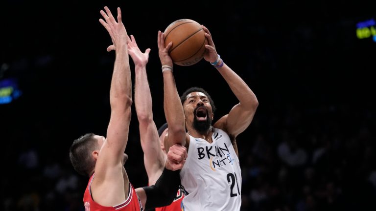 Brooklyn Nets guard Spencer Dinwiddie (26) goes to the basket against Chicago Bulls center Nikola Vucevic, left, during the first half of an NBA basketball game, Thursday, Feb. 9, 2023, in New York. (Mary Altaffer/AP)