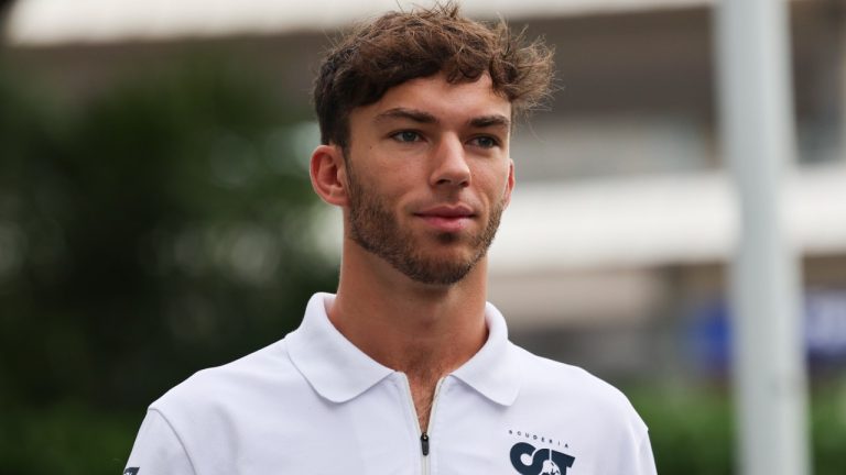 Pierre Gasly of France arrives at the Marina Bay City Circuit ahead of the Singapore Formula One Grand Prix, in Singapore, Sunday, Oct. 2, 2022. (Danial Hakim/AP)