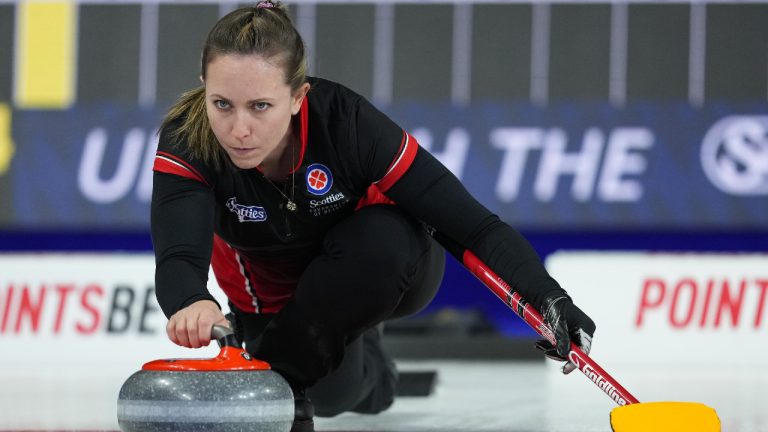 Ontario fourth Rachel Homan delivers a rock while playing Newfoundland at the Scotties Tournament of Hearts, in Kamloops, B.C., on Saturday, February 18, 2023. (Darryl Dyck/CP)