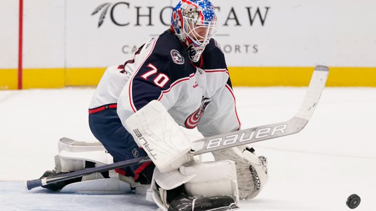 Columbus Blue Jackets goaltender Joonas Korpisalo watches the puck during the first period of the team's NHL hockey game against the Dallas Stars in Dallas, Saturday, Feb. 18, 2023. (LM Otero/AP)