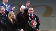 Chris Neil expresses tears of joy as Senators raise his No. 25 to the rafters