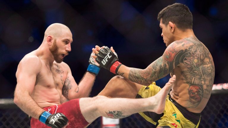 Diego Ferreira, right, fights Kyle (The Monster) Nelson, left, during the UFC Lightweight bout in Toronto on Saturday, Dec. 8, 2018. Nelson fought (The Korean Superboy) Doo-ho Choi to a majority draw Sunday on a UFC Fight Night card. (Nathan Denette/CP)