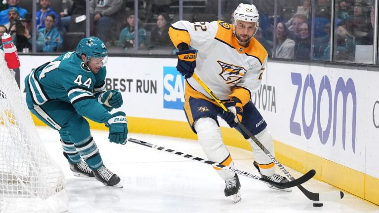 Former Nashville Predators right wing Nino Niederreiter (22) skates with the puck against San Jose Sharks defenseman Marc-Edouard Vlasic (44) during the first period of an NHL hockey game Thursday, Feb. 23, 2023, in San Jose, Calif. (Darren Yamashita/AP)