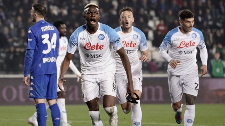 Napoli's Victor James Osimhen celebrates scoring, during the Serie A soccer match between Empoli and Napoli at Castellani Stadium in Empoli, Italy, Saturday Feb. 25, 2023. (Marco Bucco/LaPresse via AP)