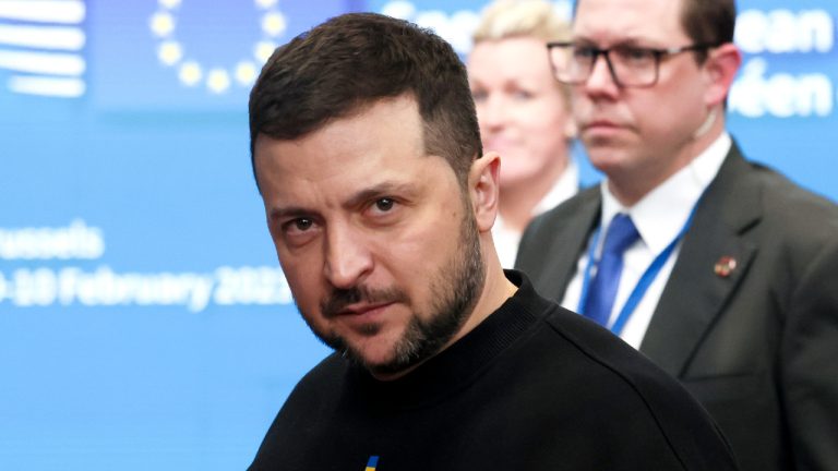 Ukraine's President Volodymyr Zelenskyy, left, leaves after meeting European Union leaders at an EU summit in Brussels on Thursday, Feb. 9, 2023. European Union leaders are meeting for an EU summit on Thursday to discuss Ukraine and migration. (Yves Herman, Pool Photo via AP)