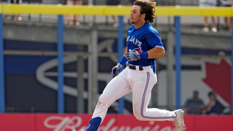 Toronto Blue Jays' Addison Barger races into second base with a double off Minnesota Twins pitcher Randy Dobnak during the fifth inning of a spring training baseball game Wednesday, March 8, 2023, in Dunedin, Fla. (Chris O'Meara/AP)