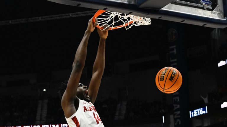 Alabama centre Charles Bediako (14) dunks against Texas A&M during the first half of an NCAA college basketball game in the finals of the Southeastern Conference Tournament, Sunday, March 12, 2023, in Nashville, Tenn. (John Amis/AP)