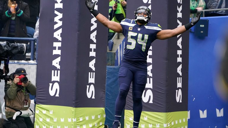 Seattle Seahawks linebacker Bobby Wagner reacts as he runs out of the tunnel before an NFL football game against the Detroit Lions, Sunday, Jan. 2, 2022, in Seattle. (Elaine Thompson/AP)