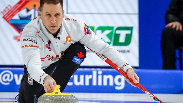 Canada skip Brad Gushue makes a shot during the men's gold medal game against Korea at the Pan Continental Curling Championships in Calgary, Alta., Sunday, Nov. 6, 2022. (Jeff Mcintosh/CP)