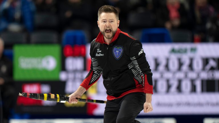 Ontario skip Mike McEwan celebrates after defeating Alberta’s Kevin Koe in playoff action at the 2023 Tim Hortons Brier in London, Ont. on Friday March 10, 2023. (Frank Gunn/CP)