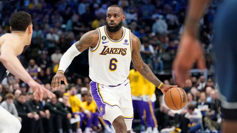 Los Angeles Lakers forward LeBron James (6) dribbles against Dallas Mavericks centre Dwight Powell during the first quarter of an NBA basketball game in Dallas, Sunday, Feb. 26, 2023. (LM Otero/AP Photo)