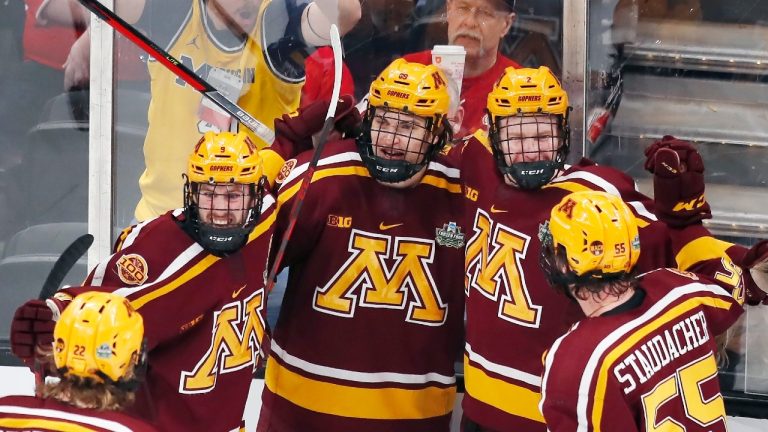 Minnesota's Matthew Knies, center rear, celebrates his goal with teammates during the first period of an NCAA men's Frozen Four college hockey semifinal against Minnesota State, Thursday, April 7, 2022, in Boston. (Michael Dwyer/AP)