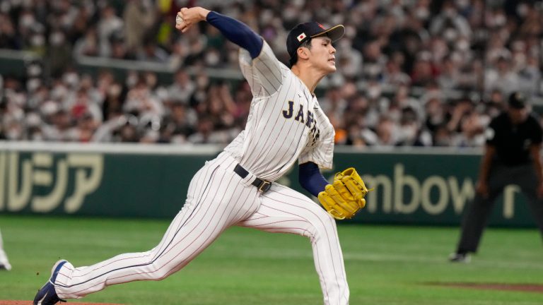 Roki Sasaki of Japan pitches during their Pool B game against the Czech Republic at the World Baseball Classic at the Tokyo Dome, Japan, Saturday, March 11, 2023. (AP Photo/Eugene Hoshiko)