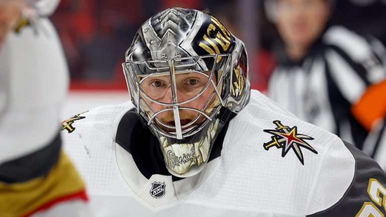 Vegas Golden Knights goaltender Jonathan Quick (32) watches the puck during the second period of an NHL hockey game against the Carolina Hurricanes in Raleigh, N.C., Saturday, March 11, 2023. (Karl B DeBlaker/AP) 