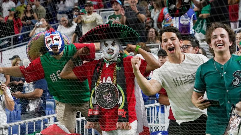 Mexico fans celebrate the 5-4 win over Puerto Rico during a World Baseball Classic game, Friday, March 17, 2023, in Miami. (Marta Lavandier/AP Photo)