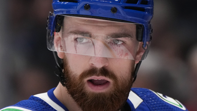 Vancouver Canucks' Filip Hronek waits for a faceoff against the San Jose Sharks during the first period of an NHL hockey game in Vancouver, B.C., Thursday, March 23, 2023. (CP)