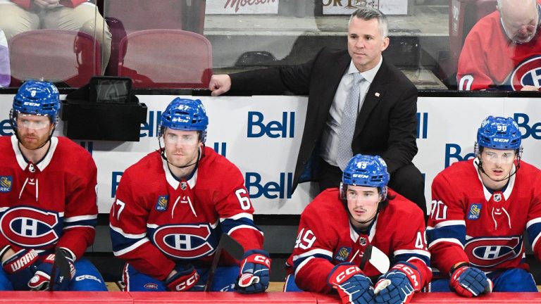 Montreal Canadiens head coach Martin St. Louis looks on from behind the bench during second period NHL hockey action against the New Jersey Devils in Montreal, Saturday, March 11, 2023. (Graham Hughes/CP)