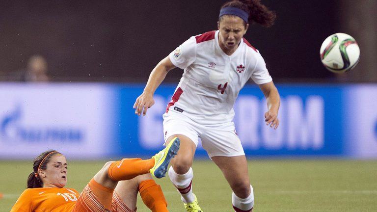 Canada's Carmelina Moscato battles Netherlands' Danielle Van De Donk during first half Women's World Cup soccer in Montreal, Monday, June 15, 2015. (Ryan Remiorz/AP)