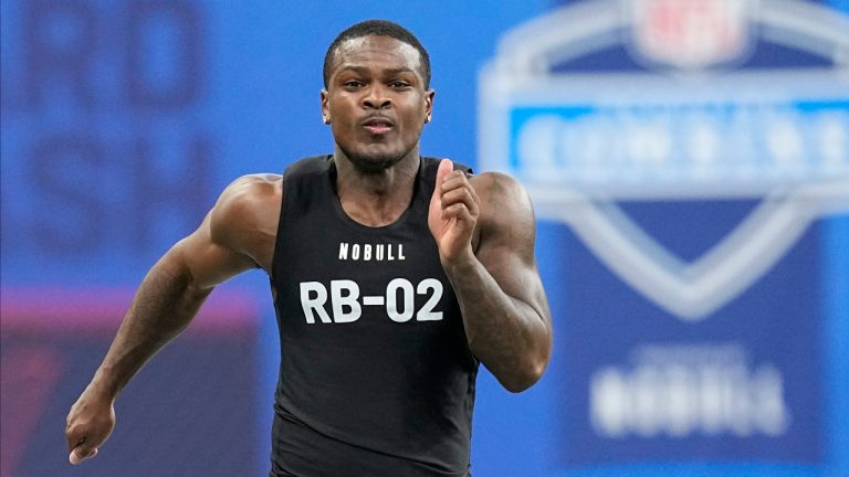 Texas A&M running back Devon Achane runs the 40-yard dash at the NFL football scouting combine in Indianapolis, Sunday, March 5, 2023. (Darron Cummings/AP)