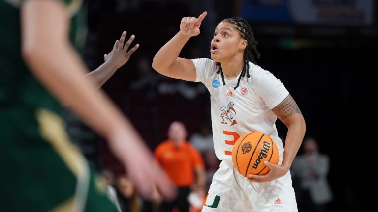 Miami forward Destiny Harden directs teammates against South Florida during the first half a first-round game in the NCAA women's college basketball tournament, Friday, March 18, 2022, in Columbia, S.C. (Sean Rayford/AP)