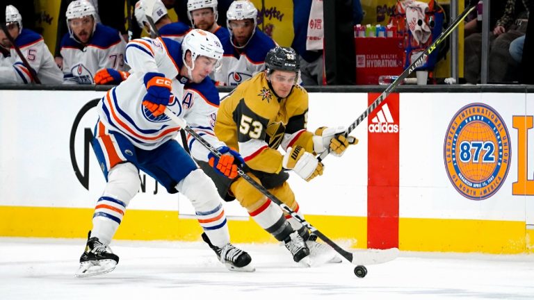 Edmonton Oilers center Ryan Nugent-Hopkins (93) skates with the puck against Vegas Golden Knights center Teddy Blueger (53) during the second period of an NHL hockey game Tuesday, March 28, 2023, in Las Vegas. (Lucas Peltier/AP)