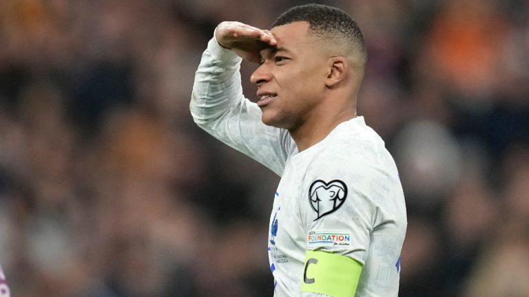 France's Kylian Mbappe celebrates their victory at the Euro 2024 group B qualifying soccer match between France and the Netherlands at the Stade de France in Saint Denis, outside Paris, France, Friday, March 24, 2023. (Christophe Ena/AP)