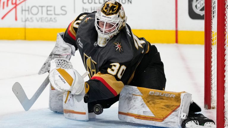 Vegas Golden Knights goaltender Jiri Patera (30) attempts a save against the Columbus Blue Jackets during the first period of an NHL hockey game Sunday, March 19, 2023, in Las Vegas. (John Locher/AP)