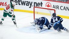 Hellebuyck drops goaltending battle in loss to Wild, Jets slip down playoff picture