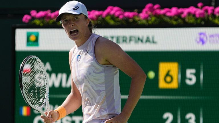 Iga Swiatek, of Poland, celebrates after defeating Sorana Cirstea, of Romania, at the BNP Paribas Open tennis tournament Thursday, March 16, 2023, in Indian Wells, Calif. (Mark J. Terrill/AP)