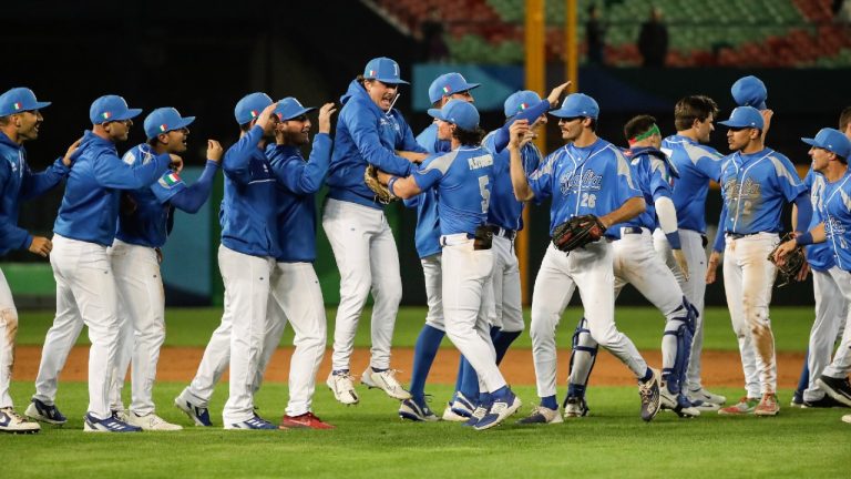 Italy's players celebrate after the team's 7-1 win over Netherlands during a Pool A game of the World Baseball Classic (WBC) at Taichung Intercontinental Baseball Stadium in Taichung, Taiwan, Sunday, March 12, 2023. (I-Hwa Cheng/AP)