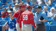 Umpire ejects Realmuto after bizarre game ball exchange