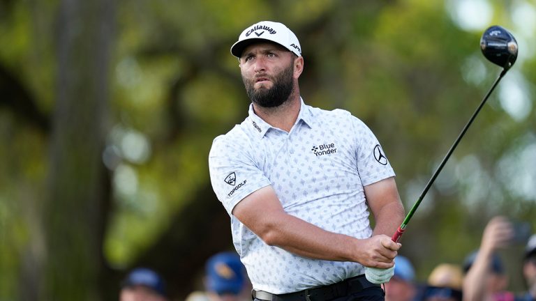 on Rahm, of Spain, watches his tee shot from the 12th tee during the first round of the Players Championship golf tournament Thursday, March 9, 2023, in Ponte Vedra Beach, Fla. (Charlie Neibergall/AP)