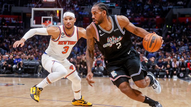 Los Angeles Clippers forward Kawhi Leonard (2) drives past New York Knicks guard Josh Hart (3) during the second half of an NBA basketball game Saturday, March 11, 2023, in Los Angeles. (Ringo H.W. Chiu/AP)