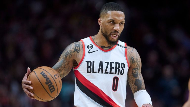 Portland Trail Blazers guard Damian Lillard brings the ball up against the New York Knicks during the second half of an NBA basketball game in Portland, Ore., Tuesday, March 14, 2023. (Craig Mitchelldyer/AP)